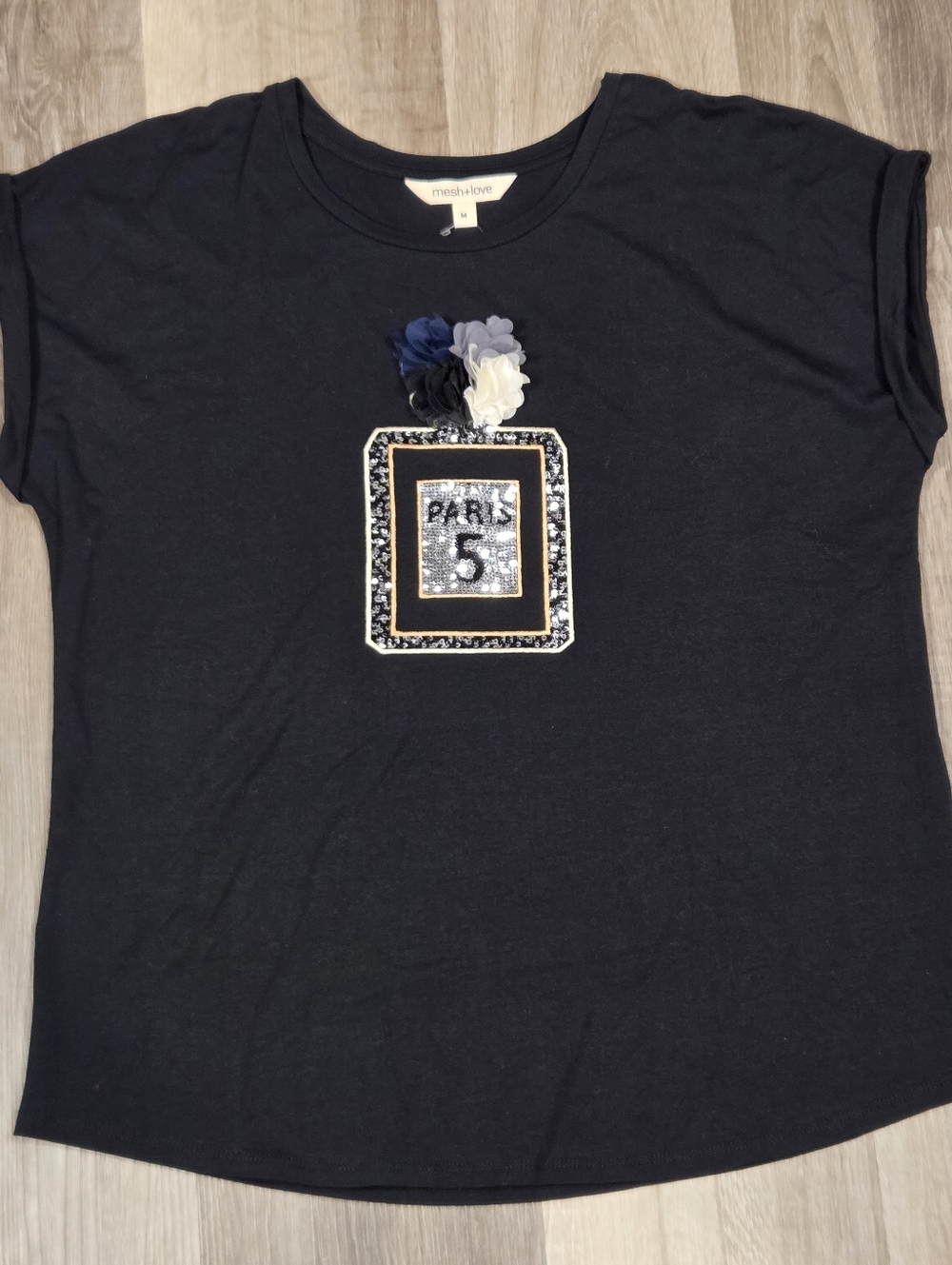 black Mesh+Love top "Paris 5" perfume bottle graphic w/ floral appliqué Medium